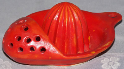 Red/orange cold painted strainer juicer