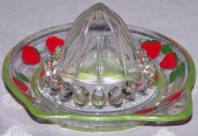 Painted strawberries on clear glass saucer juicer