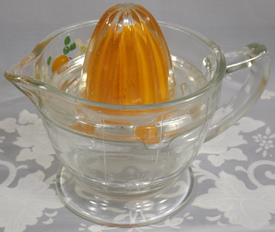 Orange with brown leaves teapot juicer