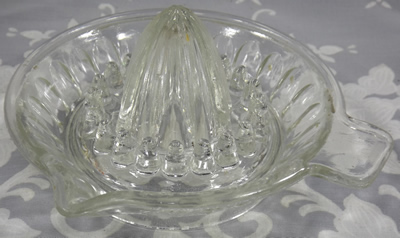 24 panel saucer shape clear glass juicer