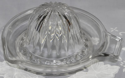 Round cone clear glass saucer juicer