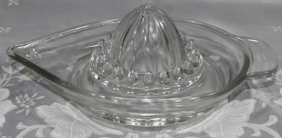 Boat shape clear glass juicer