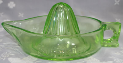 Green uranium glass curved handle Sunkist juicer