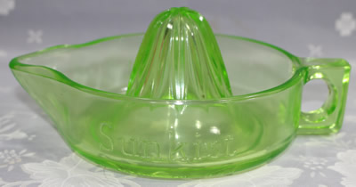 Straight handle green Sunkist juicer