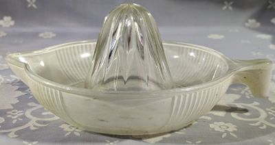 Crown Crystal Glass fired on white tear drop handle juicer