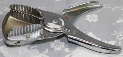 A Japan stainless steel plier like squeezer