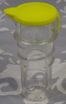 Capped clear plastic 'Clever Dick Juicer' insert juicer