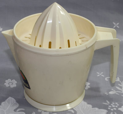 A cream colour HOSTESS brand juicer